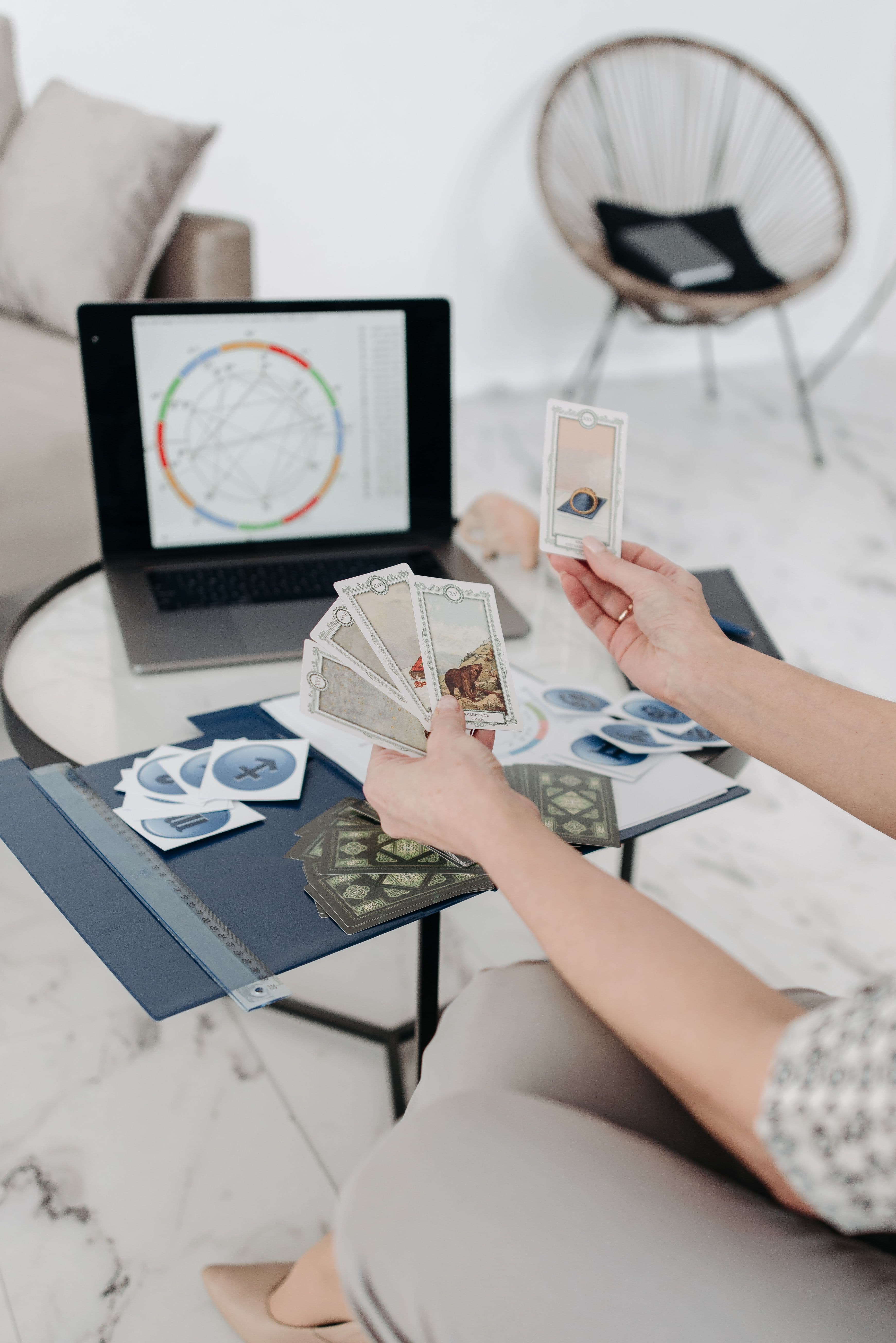 A reader preparing a spread beside client work